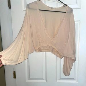 Bat wing, open crop top